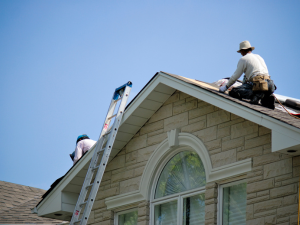 Concord roofing contractor repairing a damaged roof