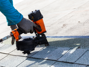 Homeowner inspecting energy-efficient roof