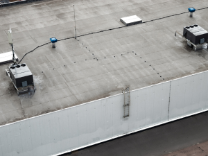 Urgent roofing repair needed on a commercial building in Dublin.