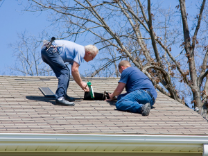 Skilled technicians performing roof leak repair in Dublin, CA.