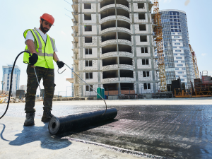 Danvile commercial roofing contractor fixing leak on commercial building